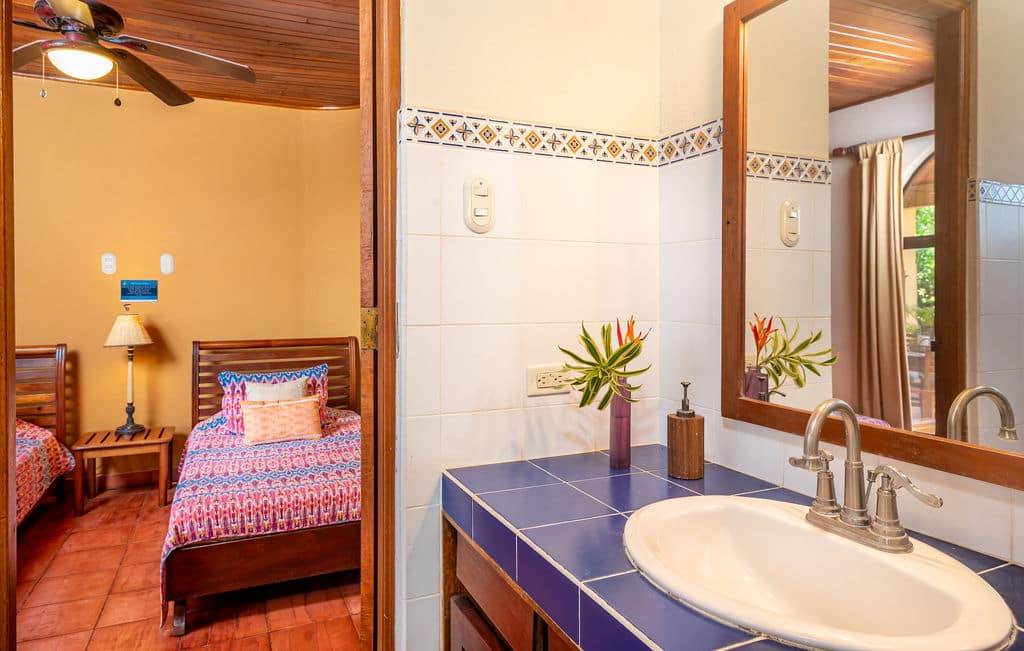 two twin beds and bathroom