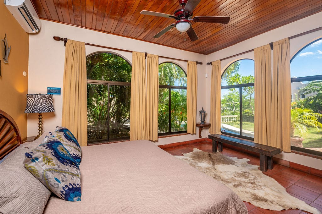 bedroom with pool view