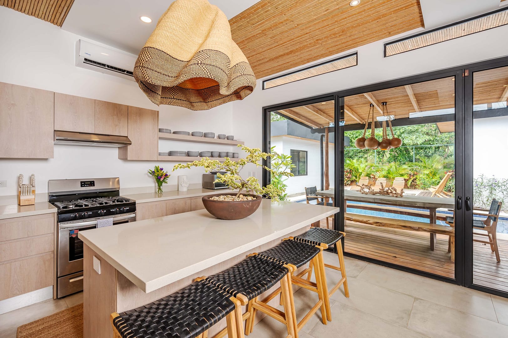 Kitchen with View of the Pool
