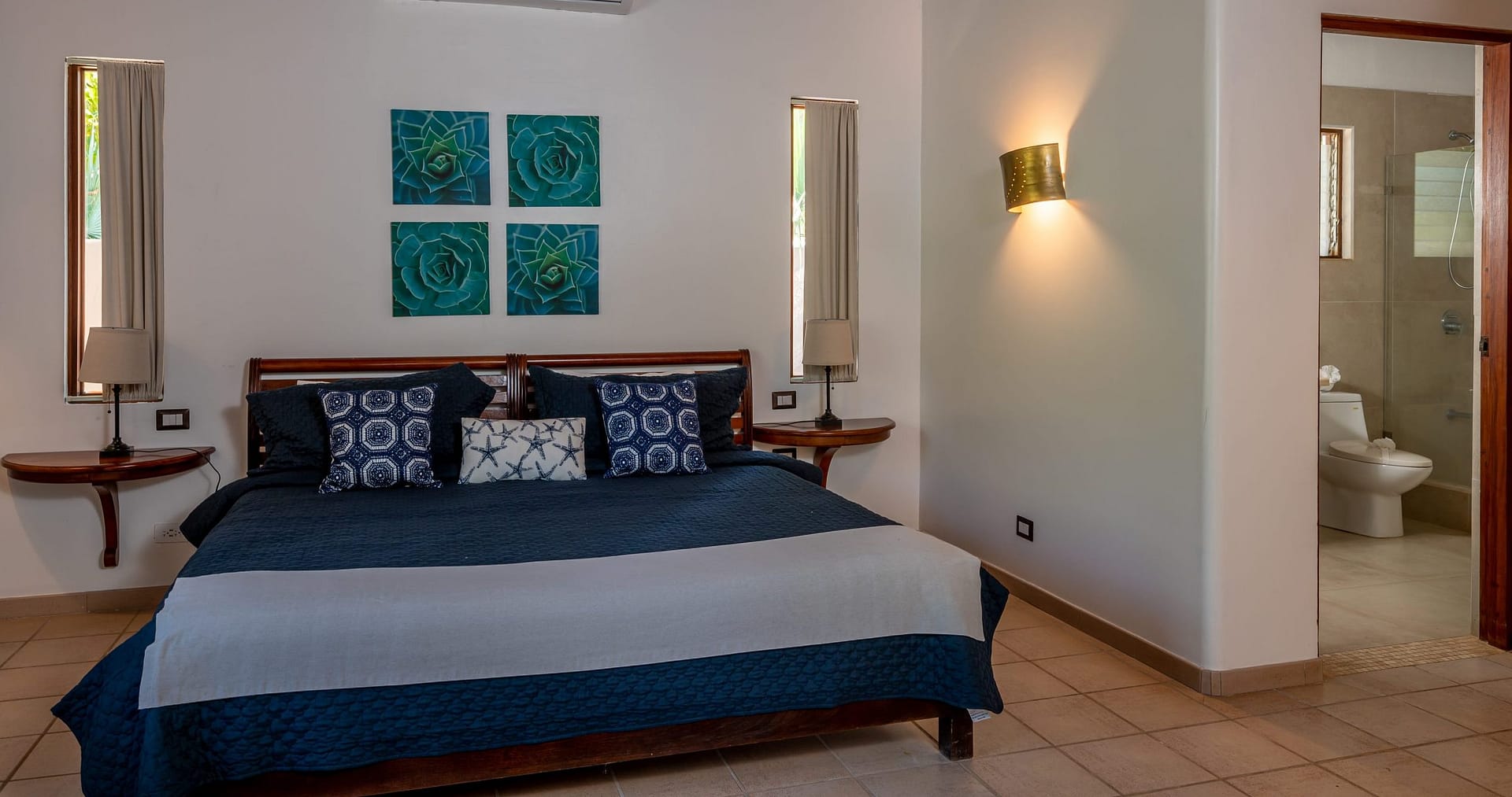 Primary Bedroom with a King size bed at Casa Bandera Roja in Langosta, Costa Rica